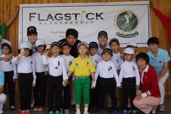 Golf course with ball near flag