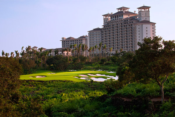 Golf course with ball near flag