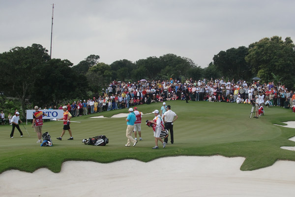 Golf course with ball near flag