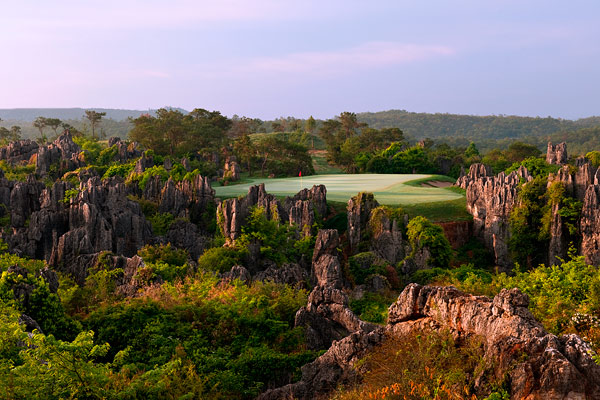 Golf course with ball near flag