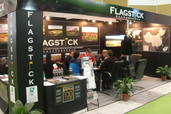 Golf course with ball near flag