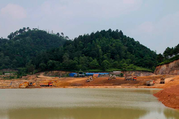 Golf course with ball near flag