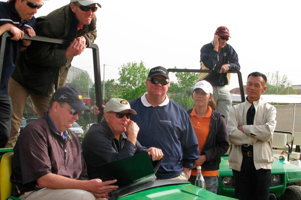 Golf course with ball near flag