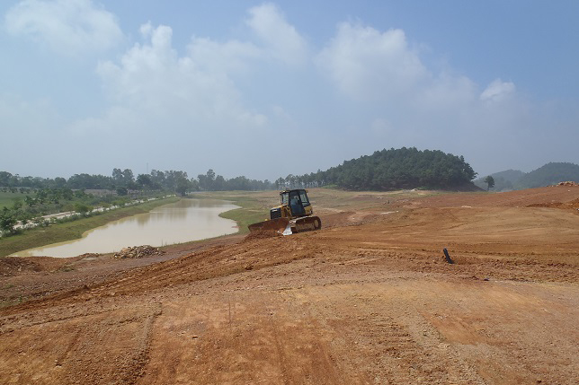 Golf course with ball near flag